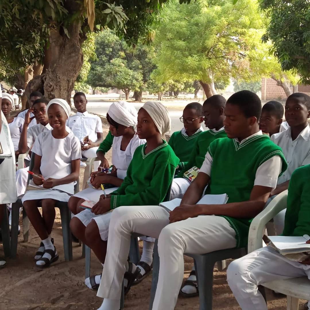 Morning assembly under the trees
